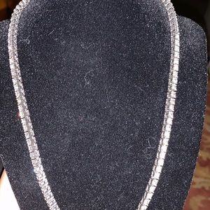 18 Inch Tennis chain, super shiny White gold plated, missing one diamond.